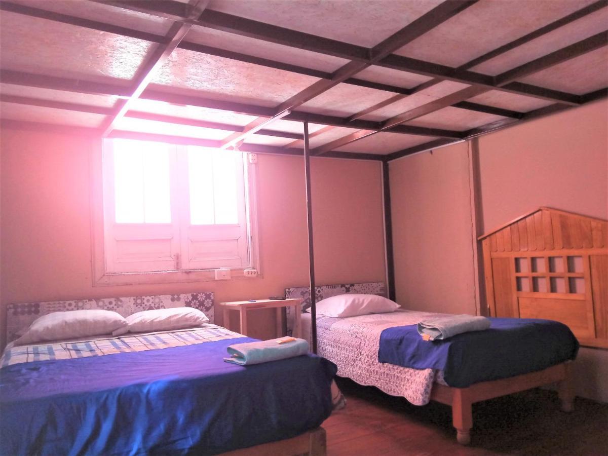 Quarto em Acomodações Particulares Casona Moya *